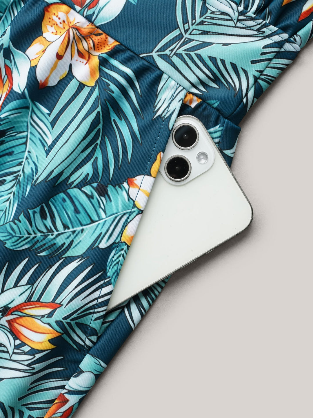 Fato de banho de uma peça com bolsos e estampado floral tropical