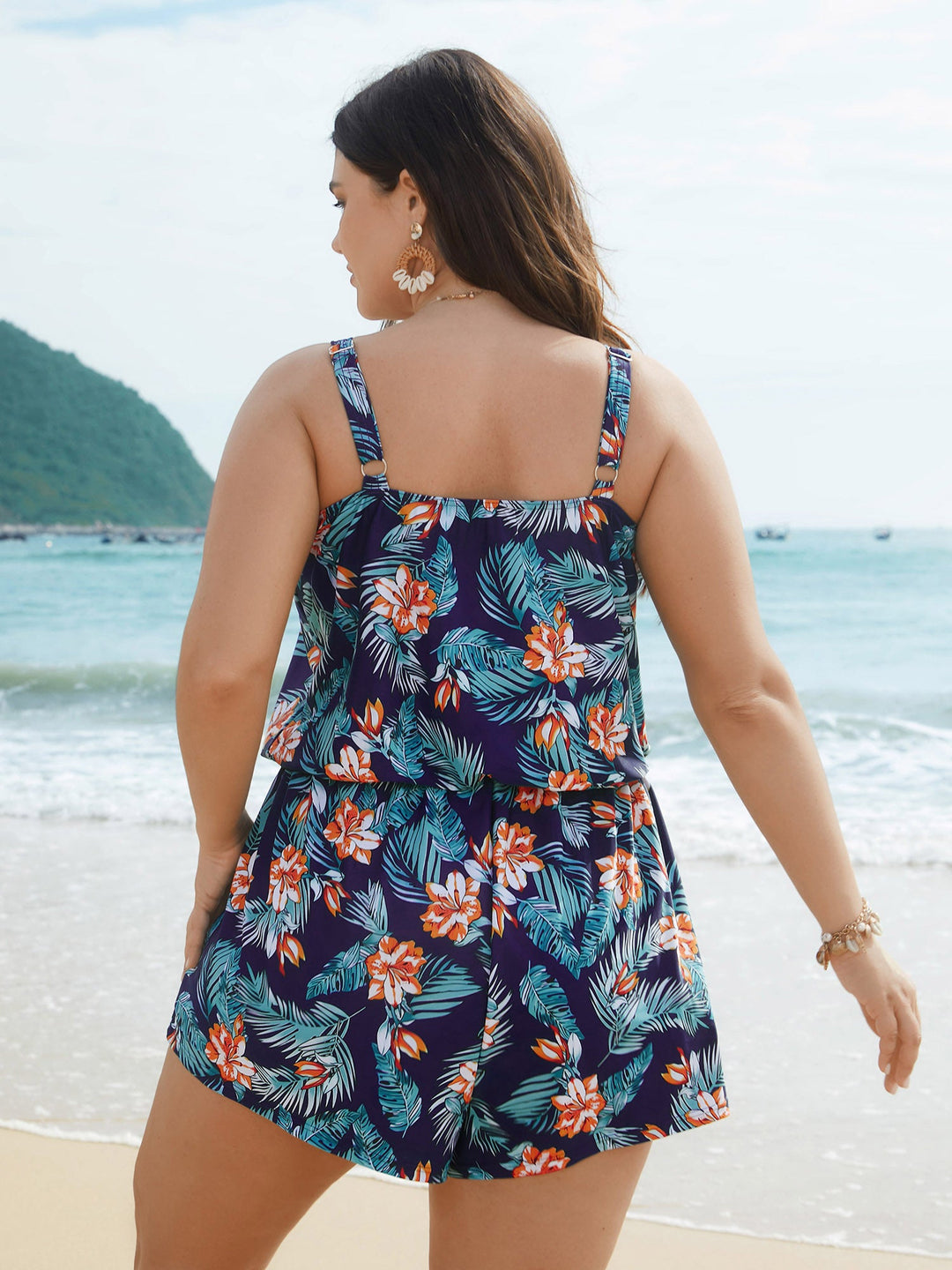 Fato de banho de uma peça com bolsos e estampado floral tropical