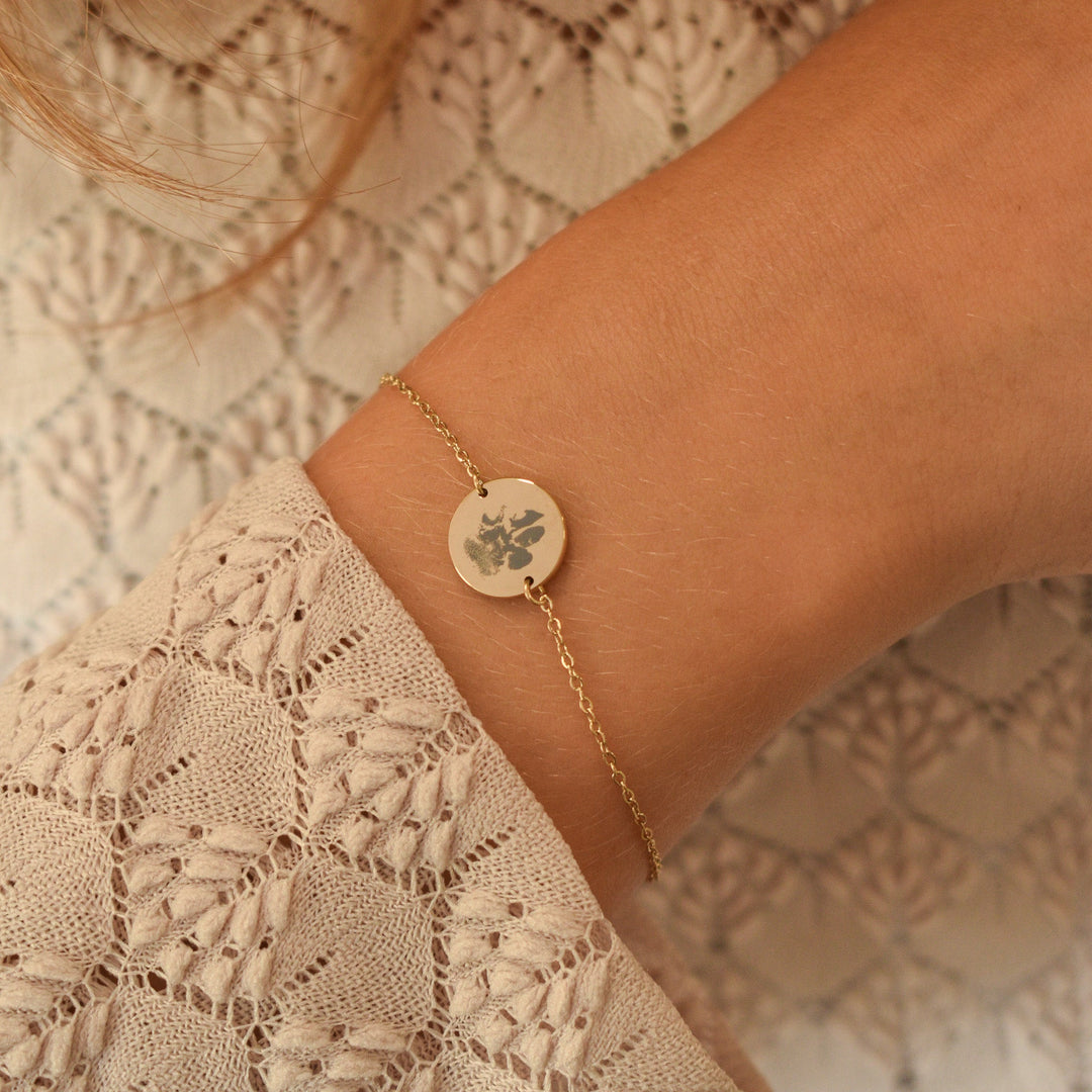 Pulseira com pegada de pé